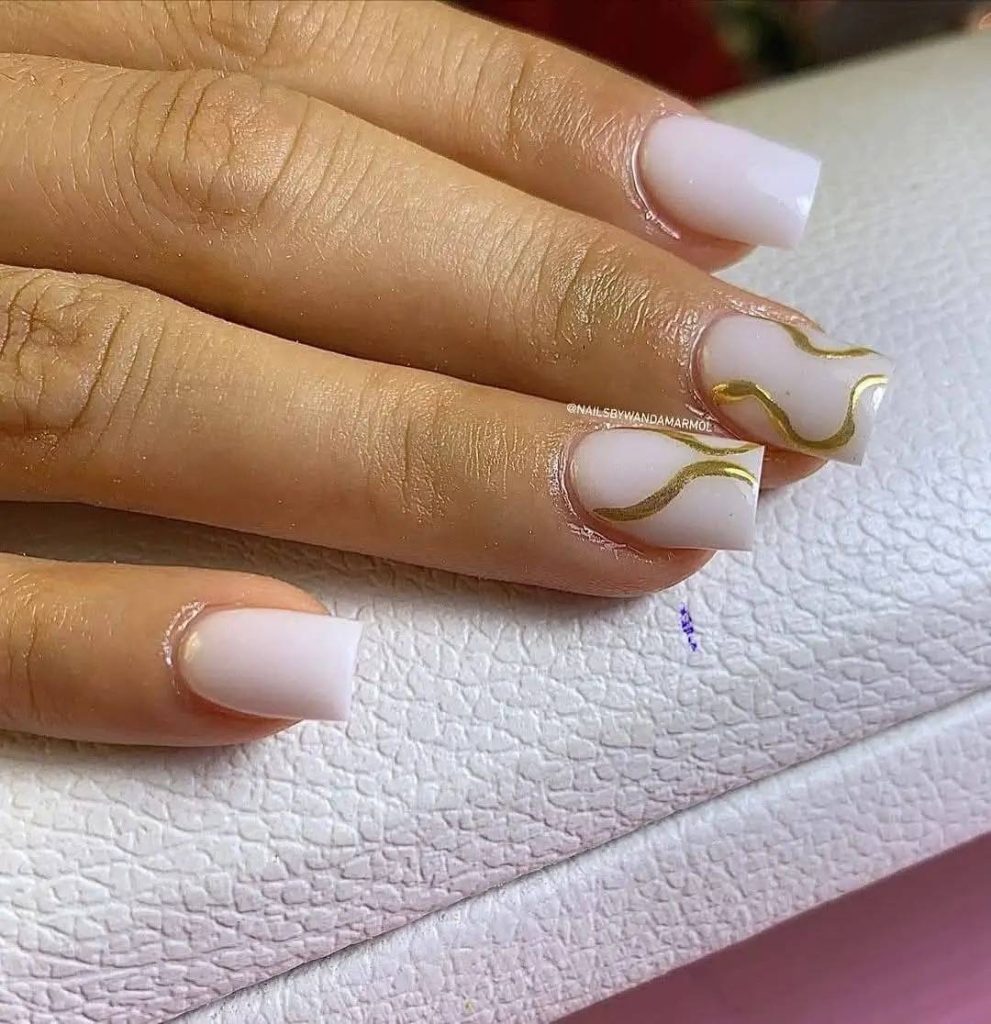 Unlock Pinterest-Worthy Nails: Your Guide to Milky White, Nude & Gold Acrylic Looks 17 Unlock Pinterest-Worthy Nails: Your Guide to Milky White, Nude & Gold Acrylic Looks