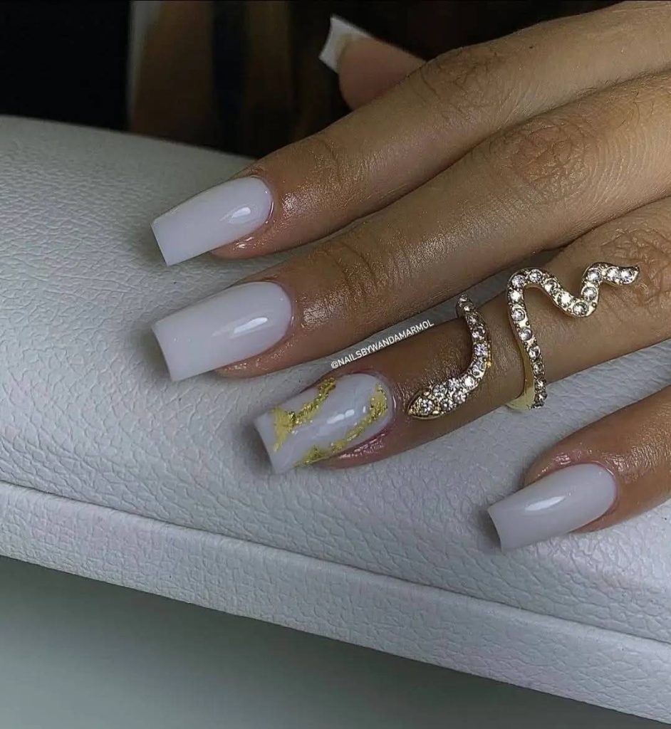 Unlock Pinterest-Worthy Nails: Your Guide to Milky White, Nude & Gold Acrylic Looks 24 Unlock Pinterest-Worthy Nails: Your Guide to Milky White, Nude & Gold Acrylic Looks